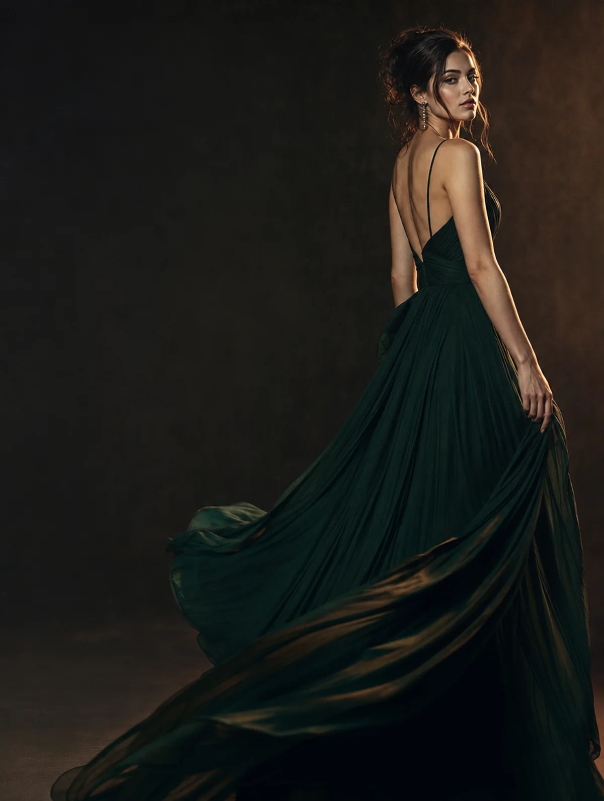Generated fashion campaign still of a model in a flowing emerald evening dress